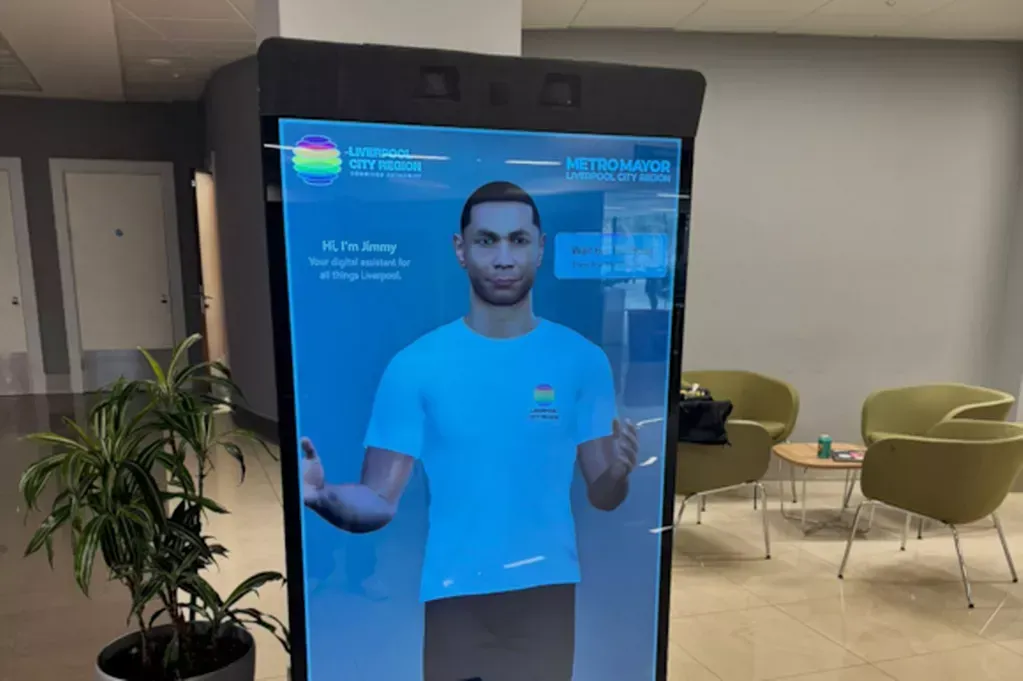 Jimmy greeting visitors from a free-standing screen