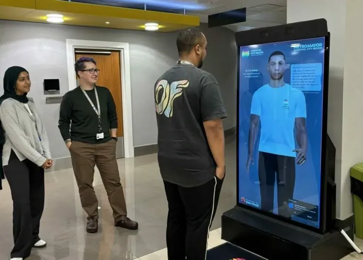 Three people talking to Jimmy on a free-standing screen