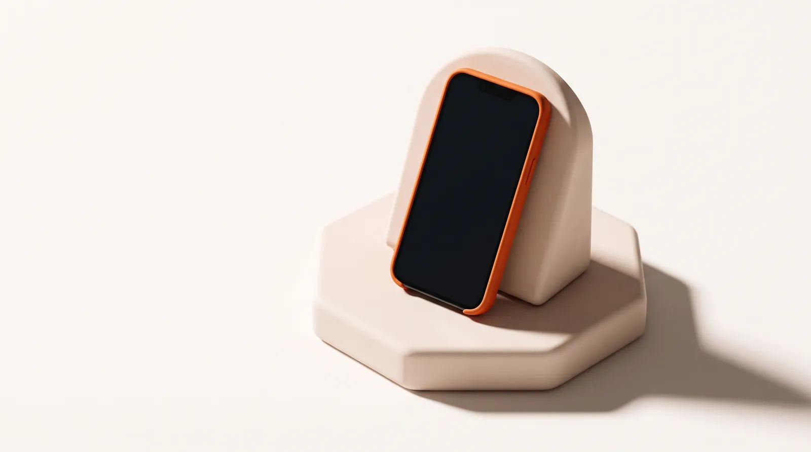 A smartphone resting against a table card
